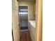 Laundry area adjacent to garage with white washer and dryer at 3394 Brookfield Dr, Las Vegas, NV 89120