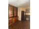 Office with built-in wood bookshelves, cabinets, and a classic desk offers a functional workspace at 3394 Brookfield Dr, Las Vegas, NV 89120