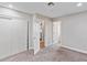 Bright bedroom with neutral carpet, large closet, and white trim at 3412 Tabor Ave, North Las Vegas, NV 89030