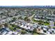 Overhead view of the neighborhood showcasing mature trees, community pool, and easy access to main roads at 3553 Kensbrook St, Las Vegas, NV 89121