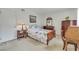 Comfortable bedroom with furniture, a large window, and soft carpet flooring at 3553 Kensbrook St, Las Vegas, NV 89121