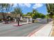 Braewood Heritage Square gated community entrance with security features and well-maintained landscaping at 3553 Kensbrook St, Las Vegas, NV 89121