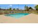 Inviting community pool with clear blue water and plenty of space for lounging in the sun at 3553 Kensbrook St, Las Vegas, NV 89121