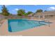 Community pool area with tables and a clear view of the community at 3553 Kensbrook St, Las Vegas, NV 89121