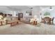 Bright and airy living room featuring neutral tones, comfortable seating, and an open layout for easy living at 3553 Kensbrook St, Las Vegas, NV 89121