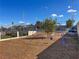 Community playground featuring swings and a safety-mulch ground cover at 3553 Kensbrook St, Las Vegas, NV 89121