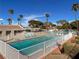 Outdoor community pool with lounge seating and sun umbrellas at 3553 Kensbrook St, Las Vegas, NV 89121