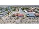 Expansive aerial view of a residential neighborhood featuring a well-maintained home with a red tile roof and desert landscaping at 3640 E Vineyard Dr, Pahrump, NV 89048