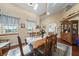 Bright and airy dining area showcases hardwood floors and plenty of space for Gathering gatherings at 3640 E Vineyard Dr, Pahrump, NV 89048
