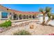 Charming single-story home boasts desert landscaping, decorative rock, and a cozy covered porch at 3640 E Vineyard Dr, Pahrump, NV 89048