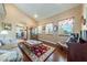 Relaxing living room offers hardwood floors, plenty of natural light and access to other rooms at 3640 E Vineyard Dr, Pahrump, NV 89048