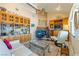 Comfortable living room featuring a cozy fireplace and built-in wooden cabinets at 3640 E Vineyard Dr, Pahrump, NV 89048