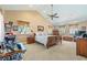 Spacious bedroom featuring neutral carpet, ample natural light, and traditional furnishings at 3640 E Vineyard Dr, Pahrump, NV 89048