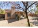 Backyard featuring gravel and covered patio attached to a one-story home at 368 Umbria Way, Henderson, NV 89014