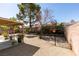 Spacious backyard featuring gravel, brick perimeter, and partial shade coverage at 368 Umbria Way, Henderson, NV 89014