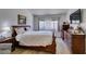 Inviting bedroom with wood floors, warm lighting, and coordinated decor at 368 Umbria Way, Henderson, NV 89014