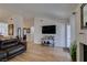 The open living area has wood floors and lots of natural light for a cozy comfortable home at 368 Umbria Way, Henderson, NV 89014
