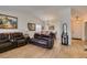 Inviting living room featuring hardwood floors, neutral paint, and comfortable seating for relaxing and entertaining at 368 Umbria Way, Henderson, NV 89014