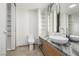 Bright bathroom with granite countertop, modern sink, and open shelving at 3722 Las Vegas Blvd # 2509, Las Vegas, NV 89158