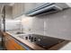 Contemporary kitchen showcasing stainless steel appliances, backsplash, and sleek cabinetry at 3722 Las Vegas Blvd # 2509, Las Vegas, NV 89158