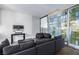 Cozy living space with gray couches, floor-to-ceiling windows, and modern decor at 3722 Las Vegas Blvd # 2509, Las Vegas, NV 89158