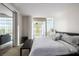 Comfortable bedroom with city views and a cozy seating area at 3722 Las Vegas Blvd # 2509, Las Vegas, NV 89158