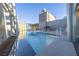 Beautiful rooftop pool with city views, featuring a clear barrier and overhead architectural elements at 3722 Las Vegas Blvd # 2509, Las Vegas, NV 89158