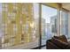 Enjoy stunning city views from this living room with floor-to-ceiling windows and comfortable seating at 3722 Las Vegas Blvd # 2509, Las Vegas, NV 89158
