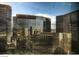 Modern high-rise buildings with glass exteriors reflecting the city skyline at 3726 Las Vegas Blvd # 3202, Las Vegas, NV 89158