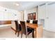 Modern dining area features a wood table, leather chairs, and sleek cabinetry for a contemporary look at 3726 Las Vegas Blvd # 3202, Las Vegas, NV 89158