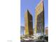 Modern high-rise condo building with stunning yellow glass exterior and city views at 3726 Las Vegas Blvd # 3202, Las Vegas, NV 89158