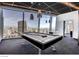 Modern game room with a pool table and city view, perfect for entertainment at 3726 Las Vegas Blvd # 3202, Las Vegas, NV 89158