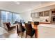 Open floor plan with modern kitchen and living area, floor-to-ceiling windows offer stunning city views at 3726 Las Vegas Blvd # 3202, Las Vegas, NV 89158