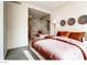 Serene main bedroom features plush bedding, stylish decor, and an open view to the ensuite bath at 3726 Las Vegas Blvd # 3202, Las Vegas, NV 89158