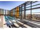 A glass-enclosed rooftop pool offers stunning city views and a luxurious sunbathing area at 3726 Las Vegas Blvd # 3202, Las Vegas, NV 89158
