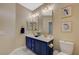 This bathroom features double sinks with modern fixtures and elegant decor at 3728 Richard Allen Ct, Las Vegas, NV 89147