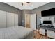 This gray bedroom features a corner office setup, providing a functional and stylish space at 3728 Richard Allen Ct, Las Vegas, NV 89147