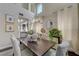 Elegant dining room features a wood table, stylish chairs, and decor at 3728 Richard Allen Ct, Las Vegas, NV 89147