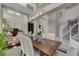 Spacious dining room features high ceilings, a modern chandelier, and stylish decor at 3728 Richard Allen Ct, Las Vegas, NV 89147