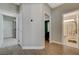 Hallway view with open doorway to bathroom, bedroom, and laundry room at 3728 Richard Allen Ct, Las Vegas, NV 89147