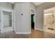 Hallway view with open doorway to bathroom, bedroom, and laundry room at 3728 Richard Allen Ct, Las Vegas, NV 89147