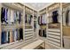 Spacious walk-in closet with custom shelving, drawers, and ample storage for clothes and accessories at 3728 Richard Allen Ct, Las Vegas, NV 89147