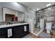 Stylish bathroom offers a glass-enclosed shower and a double sink vanity with modern fixtures at 3928 Edgemoor Way, Las Vegas, NV 89121