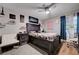 Bedroom featuring ample decor space, and large windows that provide natural light, creating a bright and inviting atmosphere at 3928 Edgemoor Way, Las Vegas, NV 89121
