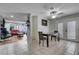Cozy dining area that leads to a sunlit living room with stylish furnishings at 3928 Edgemoor Way, Las Vegas, NV 89121