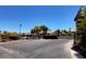 Gated entrance to Forest Hills community offers privacy, landscaping, and mature trees at 3928 Edgemoor Way, Las Vegas, NV 89121