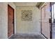 Inviting entryway with an ornate iron gate and a wooden door, offering both security and style at 3928 Edgemoor Way, Las Vegas, NV 89121
