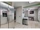 Spacious kitchen area with stainless steel refrigerator and an adjacent dining space at 3928 Edgemoor Way, Las Vegas, NV 89121