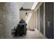 Enclosed patio with tiled floor, a grill, and outdoor screens at 3928 Edgemoor Way, Las Vegas, NV 89121