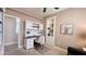 Inviting bedroom with a built-in desk and bookcase for a functional and stylish living space at 4299 Fiore Bella Blvd, Las Vegas, NV 89135